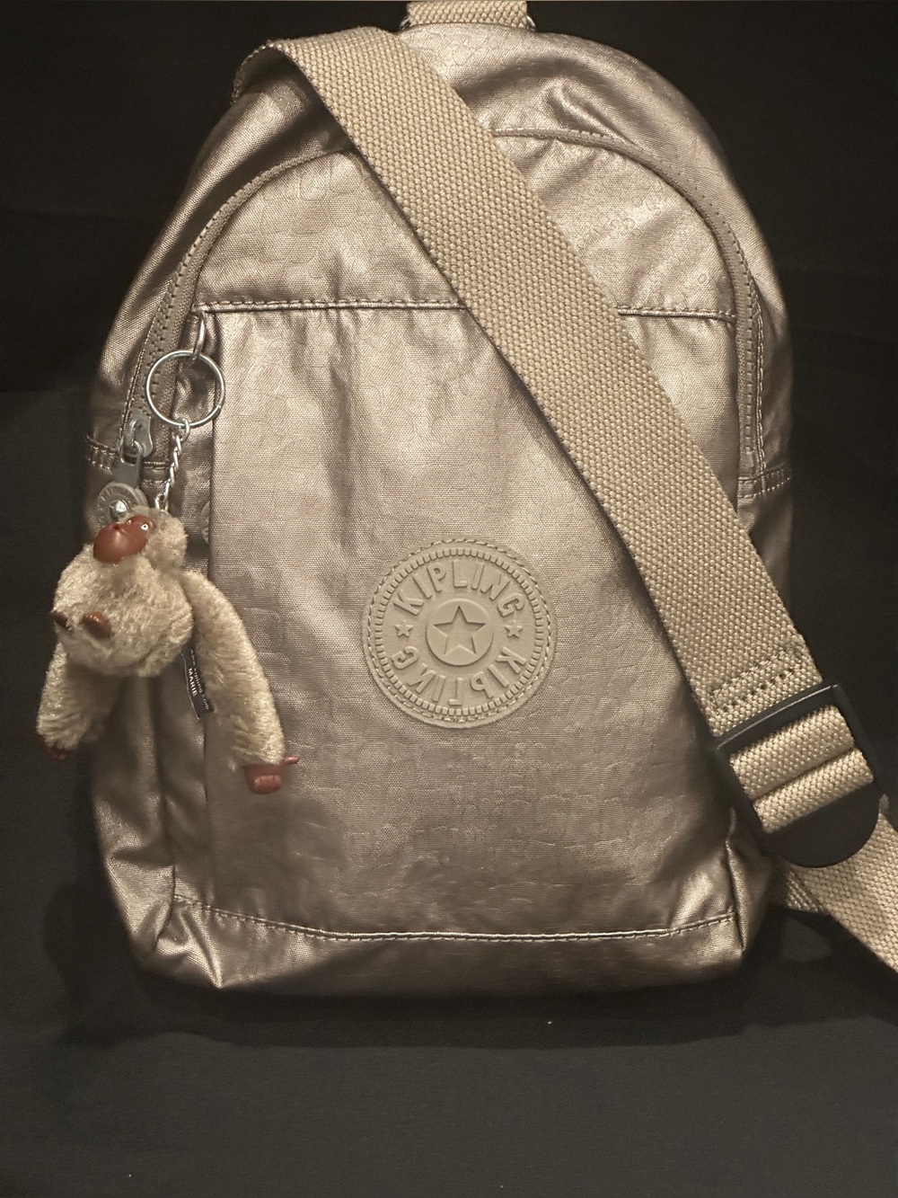 Kipling Metallic Champagne Crossbody Backpack with Monkey Keychain